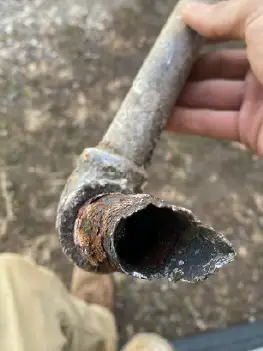 Well pump system installation process showing new pump materials