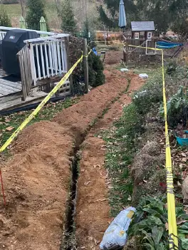 Sewer line inspection and repair process showing new pipe materials