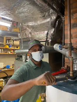 Well pump system installation process showing new pump materials