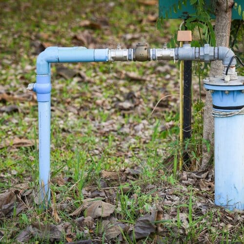 groundwater well attached to a plumbing pump