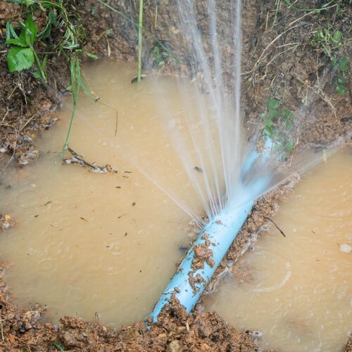 burst water line surrounded by water