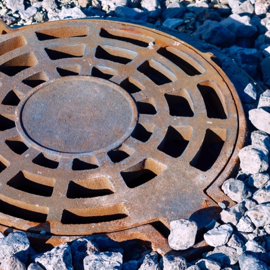 cast iron drain and gravel